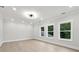 Bright bedroom with hardwood floors, recessed lights, and multiple windows offering beautiful views at 3165 Hall Rd, Dacula, GA 30019