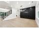A bright dining room featuring hardwood floors, decorative lighting, and an open layout at 3165 Hall Rd, Dacula, GA 30019