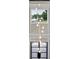 Modern staircase featuring a dramatic chandelier, large windows and neutral walls at 3165 Hall Rd, Dacula, GA 30019