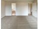 Spacious bedroom with neutral carpet, view into the en suite bathroom, and natural light at 40 Zebulon Pl, Covington, GA 30016