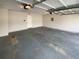 Clean two car garage with two overhead doors ready for parking and storage at 40 Zebulon Pl, Covington, GA 30016