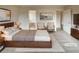 Tranquil, virtually staged main bedroom with a comfortable bed, neutral colors, and ample space at 40 Zebulon Pl, Covington, GA 30016
