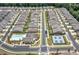 Aerial view of a neighborhood with community pool and pickleball courts at 163 Lorraine Pkwy, Woodstock, GA 30188