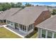 Aerial view of the backyard featuring a screened in porch and lawn at 163 Lorraine Pkwy, Woodstock, GA 30188