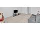 Spacious bonus room offers an extra living area, perfect for relaxation and entertainment at 163 Lorraine Pkwy, Woodstock, GA 30188