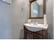A bathroom showcasing a sleek vanity with a modern sink and stylish fixtures at 4047 Round Stone Trl, Snellville, GA 30039