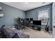 Bedroom featuring carpet, a large window, and a desk at 4047 Round Stone Trl, Snellville, GA 30039
