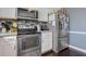 A kitchen displaying stainless steel appliances and granite countertops, offering both functionality and style at 4047 Round Stone Trl, Snellville, GA 30039