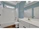 Updated bathroom featuring white vanity, tub, shower, and modern fixtures at 4330 Old Oak Trce, Cumming, GA 30041