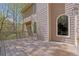 Spacious wooden deck perfect for outdoor entertaining, with nice architectural details and wooded views at 4330 Old Oak Trce, Cumming, GA 30041