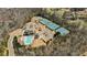 Aerial view of the community pool, clubhouse, and tennis courts at 6350 Boulder Rdg, Cumming, GA 30028