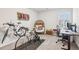 Bright bedroom featuring neutral carpet, a window with blinds, and unique medal display at 6350 Boulder Rdg, Cumming, GA 30028