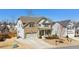 Attractive two-story home with a brick facade, covered front porch, and well-maintained front yard at 6350 Boulder Rdg, Cumming, GA 30028