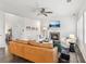 Comfortable living room with a fireplace, plush sofa, and ample natural light at 6350 Boulder Rdg, Cumming, GA 30028