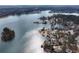 Gorgeous aerial view of the houses along a lake's shoreline at 2387 Battle Dr, Villa Rica, GA 30180