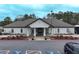 Exterior of a well-maintained clubhouse with manicured landscaping, creating an inviting space for residents at 2387 Battle Dr, Villa Rica, GA 30180