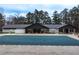 A community pool featuring a retractable cover to keep the water clean during non-use at 2387 Battle Dr, Villa Rica, GA 30180