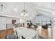 Open-concept dining room flowing into the living area, perfect for entertaining and gatherings at 2387 Battle Dr, Villa Rica, GA 30180