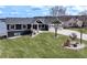 Beautiful two-story home with an attached two-car garage, well-manicured lawn and lovely landscaping at 2387 Battle Dr, Villa Rica, GA 30180