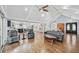 Spacious living room with vaulted ceilings, hardwood floors, and plenty of seating at 2387 Battle Dr, Villa Rica, GA 30180
