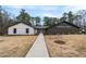 Exterior shot of a recreation center with a well-maintained lawn and landscaping at 2387 Battle Dr, Villa Rica, GA 30180