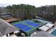 Aerial view of the well-maintained community tennis courts, offering a great space for recreation at 2387 Battle Dr, Villa Rica, GA 30180