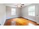 Inviting bedroom with wood floors, ceiling fan, and large windows providing lots of light at 2656 Northview Ave, Decatur, GA 30032