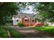 Charming single-story brick home with a covered parking area and well-maintained landscaping at 2656 Northview Ave, Decatur, GA 30032