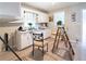 Bright kitchen showcasing white cabinets, wood-look flooring, and natural light from a window at 2656 Northview Ave, Decatur, GA 30032