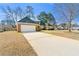Lovely brick home with an attached garage and wide driveway, set on a well-maintained lot at 4184 Wyndham Park Cir, Decatur, GA 30034
