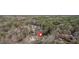 Scenic aerial view of a home with a large lot and treed surroundings at 300 Mill Creek Ct, Acworth, GA 30101