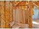 Unfinished bathroom with shower and toilet in the process of renovation at 300 Mill Creek Ct, Acworth, GA 30101