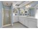 Bathroom featuring walk-in shower and dual sink vanity at 300 Mill Creek Ct, Acworth, GA 30101