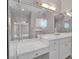 Bright bathroom featuring stylish white vanity, mirrors, and gold hardware at 300 Mill Creek Ct, Acworth, GA 30101