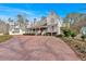 Charming white two-story home with a long front porch and a spacious driveway at 300 Mill Creek Ct, Acworth, GA 30101