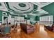 Large living space with hardwood floors, ceiling fan, and comfortable seating at 300 Mill Creek Ct, Acworth, GA 30101