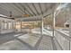 Spacious covered patio with ceiling fans, offering views of the backyard and pool at 300 Mill Creek Ct, Acworth, GA 30101