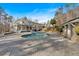 Beautiful backyard with an inviting pool, patio area, and lush landscaping at 300 Mill Creek Ct, Acworth, GA 30101