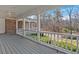 Covered porch offering scenic outdoor views of the property's landscape at 300 Mill Creek Ct, Acworth, GA 30101