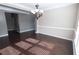 Bright dining room features hardwood floors, modern chandelier and decorative trim at 4162 Roberts Crest Dr, Suwanee, GA 30024