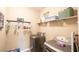 Well-organized laundry room equipped with modern washer and dryer and plenty of storage space at 4162 Roberts Crest Dr, Suwanee, GA 30024