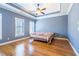Bedroom with hardwood floors, tray ceiling and large windows at 12 Candler Grove Dr, Decatur, GA 30030