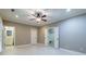 Bonus room featuring neutral colors and a ceiling fan at 12 Candler Grove Dr, Decatur, GA 30030