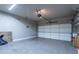 Spacious two-car garage with ample storage space and an automatic door opener at 12 Candler Grove Dr, Decatur, GA 30030
