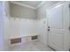 Well-organized mudroom with built-in bench and coat hooks at 12 Candler Grove Dr, Decatur, GA 30030