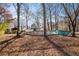View of backyard with an above ground pool at 2033 Old Newnan Rd, Carrollton, GA 30116