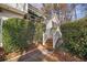 Charming entryway featuring a quaint staircase leading up to the front door with wooden steps at 2033 Old Newnan Rd, Carrollton, GA 30116