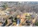 Aerial view of a home surrounded by green trees in a suburban community at 4374 Westside Nw Dr, Acworth, GA 30101