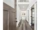 Bright entryway with hardwood floors, a soaring ceiling, and a transom window at 4374 Westside Nw Dr, Acworth, GA 30101