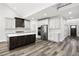 Open concept kitchen featuring a center island, stainless appliances, and ample cabinet space at 4374 Westside Nw Dr, Acworth, GA 30101
